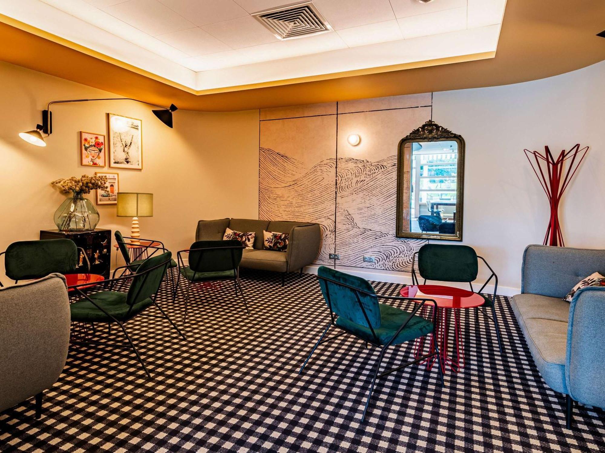 Novotel Reims Тинкё Экстерьер фото