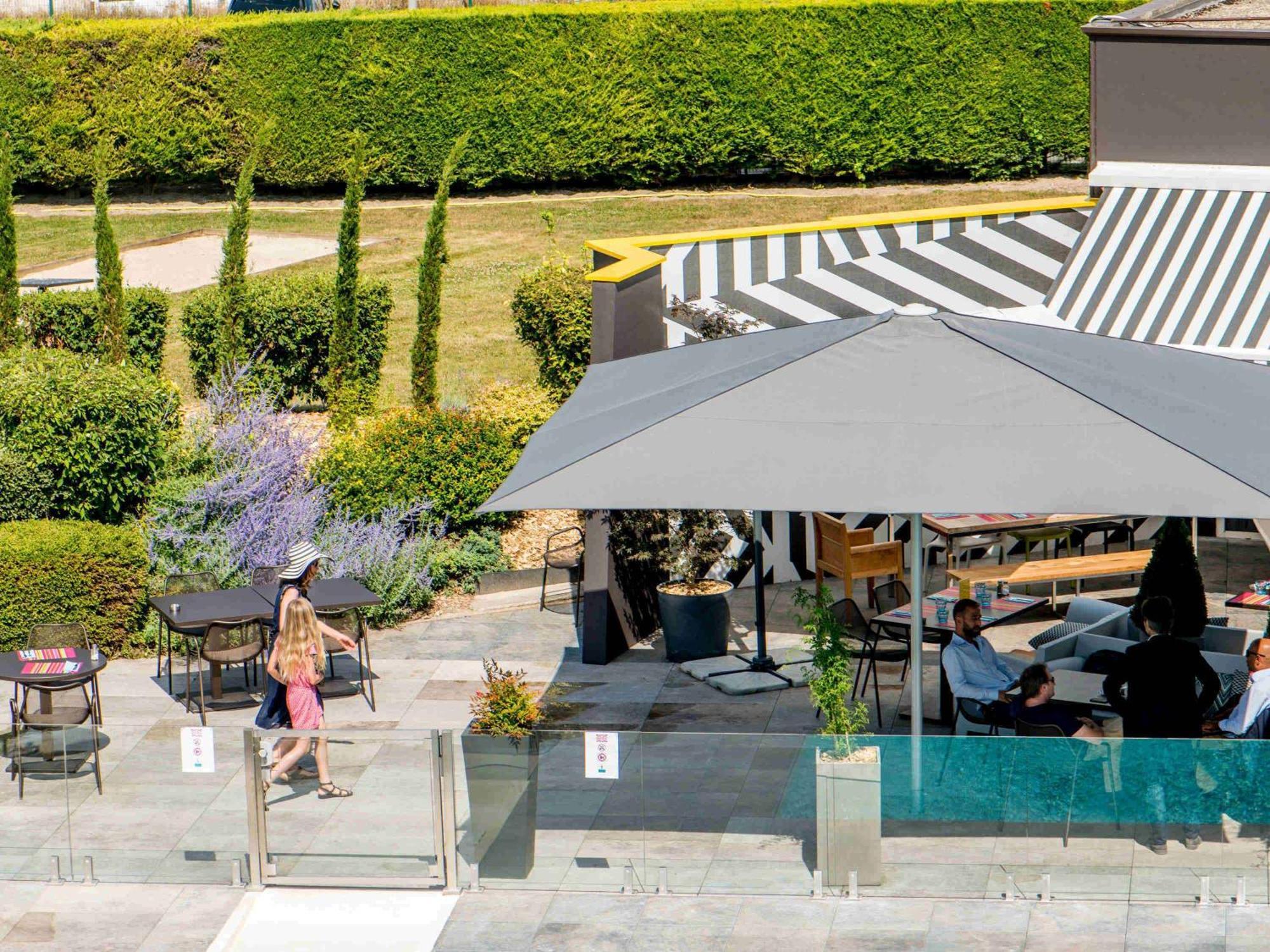 Novotel Reims Тинкё Экстерьер фото