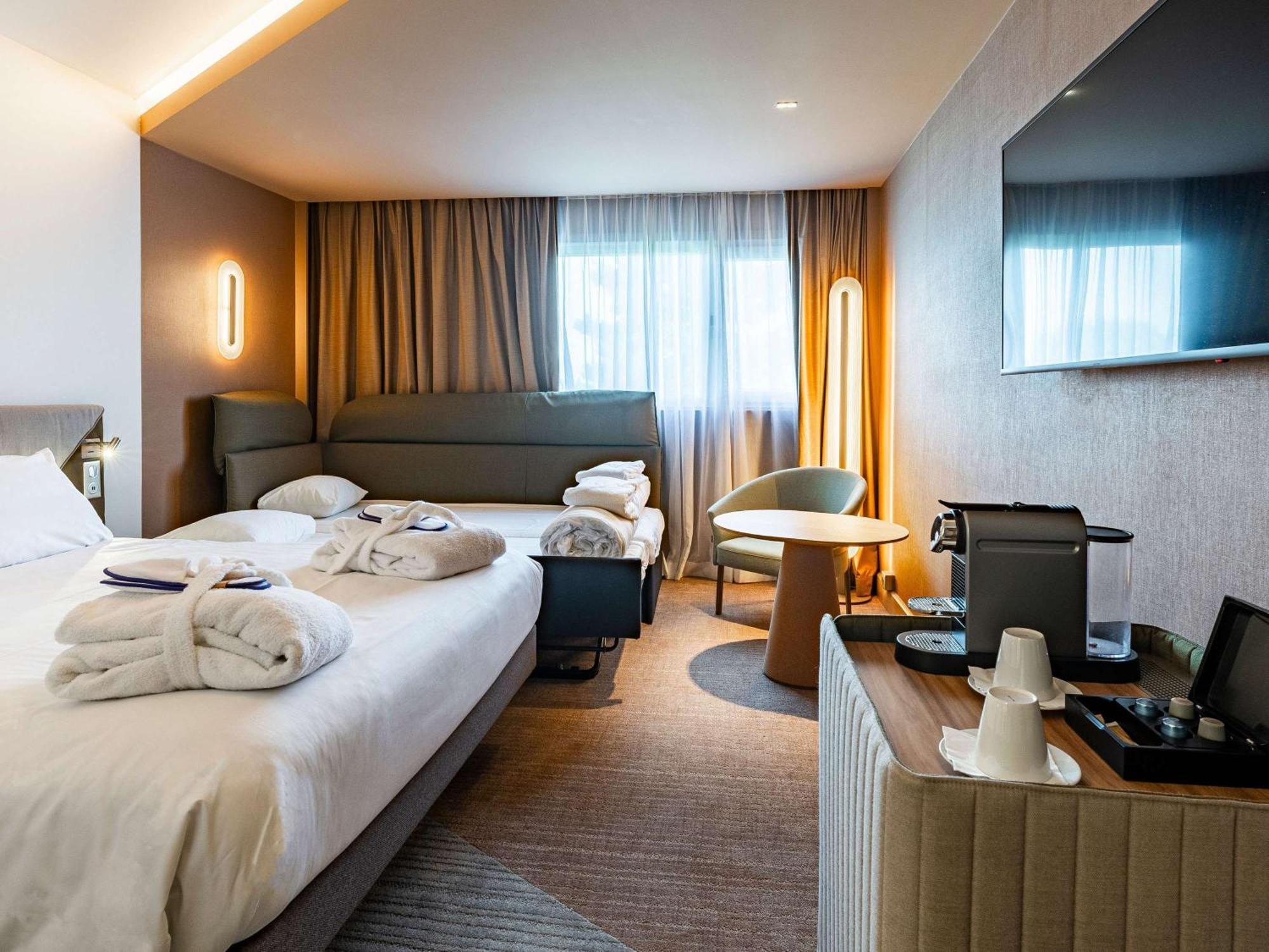 Novotel Reims Тинкё Экстерьер фото
