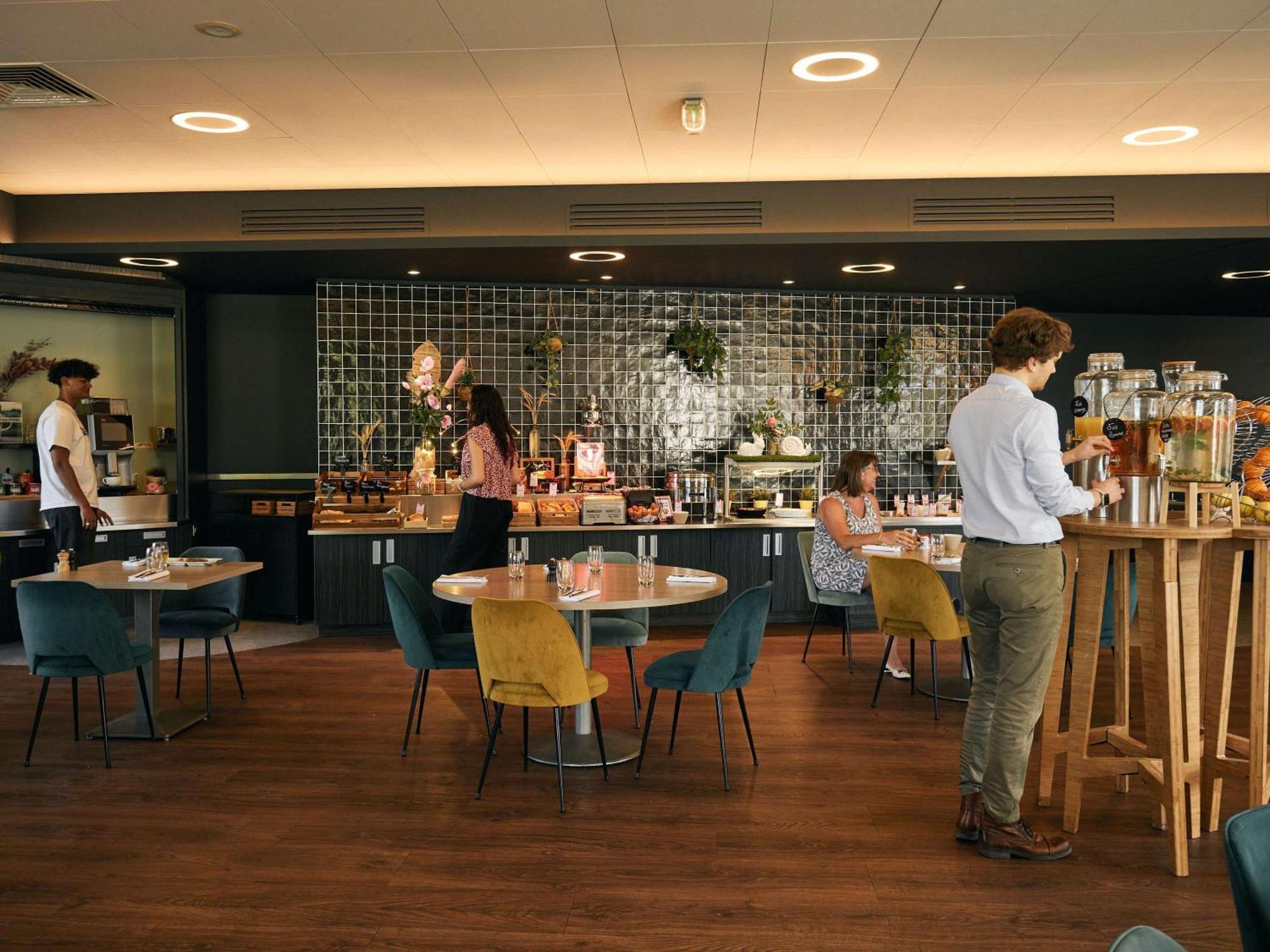 Novotel Reims Тинкё Экстерьер фото