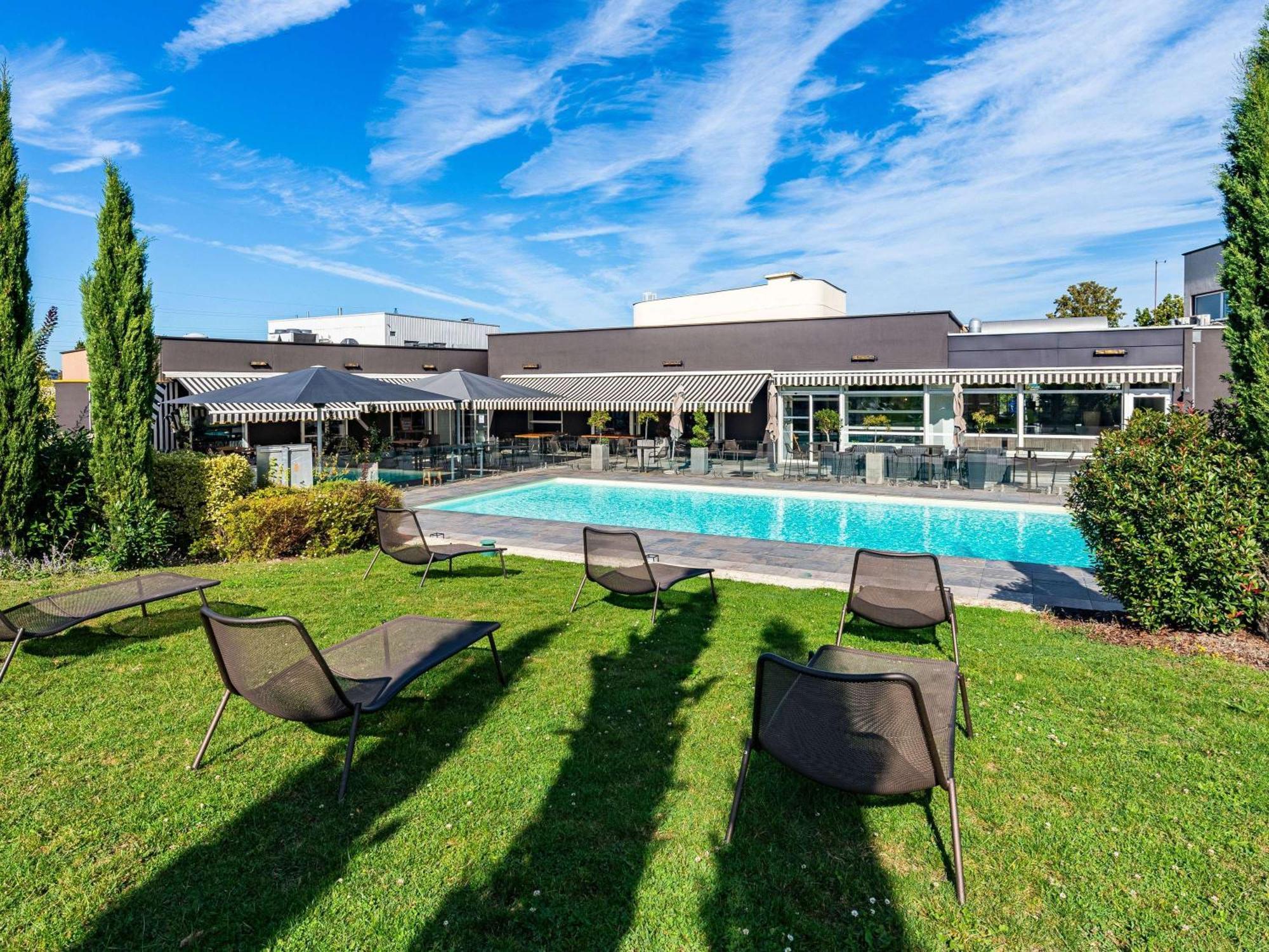 Novotel Reims Тинкё Экстерьер фото